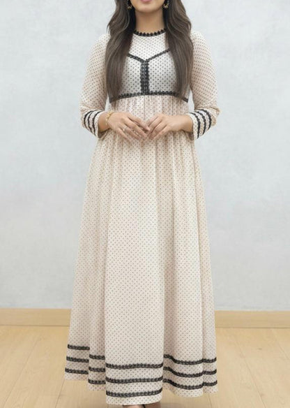 Beige Meets Black Polka Dots