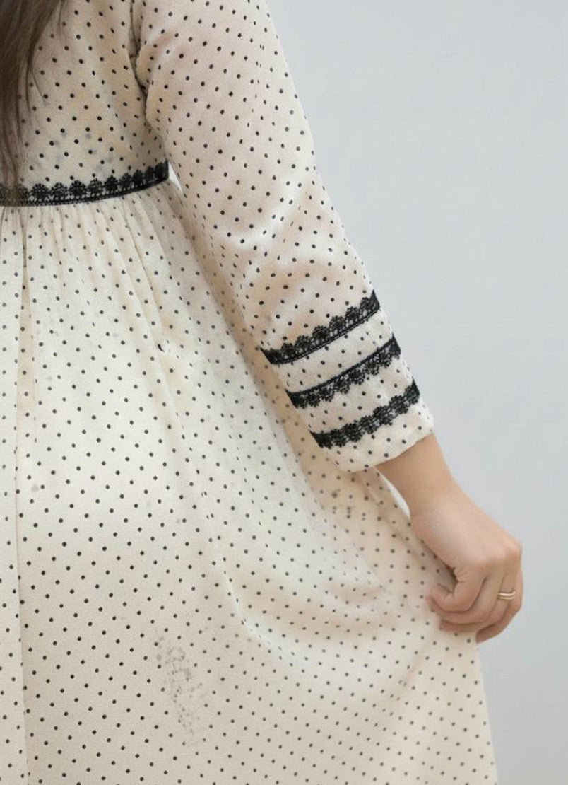 Beige Meets Black Polka Dots