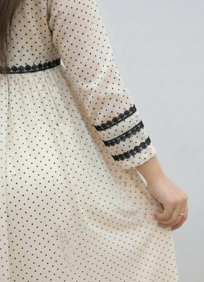 Beige Meets Black Polka Dots