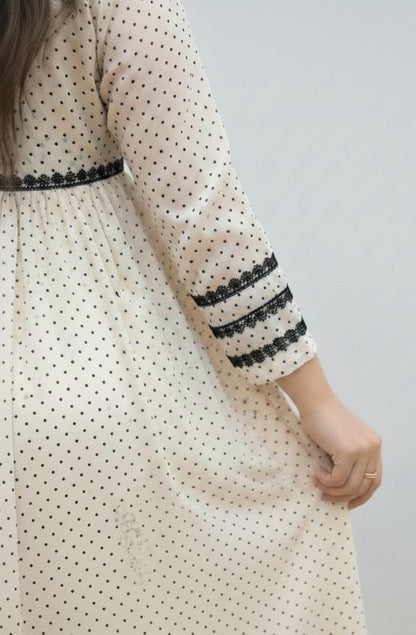 Beige Meets Black Polka Dots